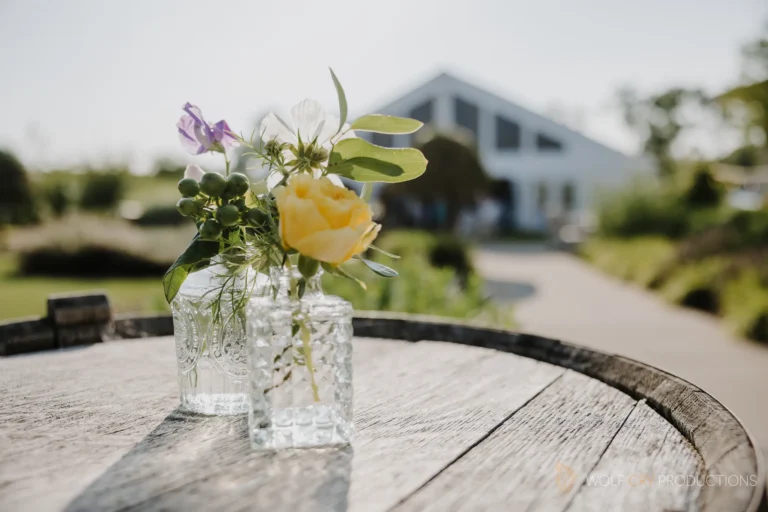 Picture of flowers in a jar on a nice spring day. Photo taken by Wolf Cry Productions. Rochester, NY